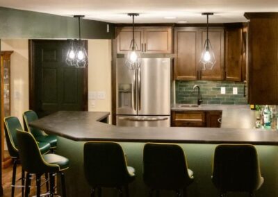 Modern kitchen with a Bar and Green Chairs, Ideal for Basement Remodeling in Appleton, WI