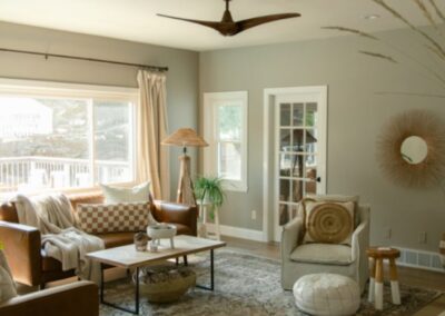 A Cozy Living Room with a Couch and Coffee Tables, Showcasing Remodeling Services in Menasha, WI