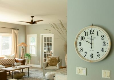 A Stylish Living Room featuring a Wall Clock, Highlighting Remodeling Services in Menasha, WI