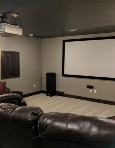 Cozy Sofa and Modern Home Theater Setup in Menasha, WI. 