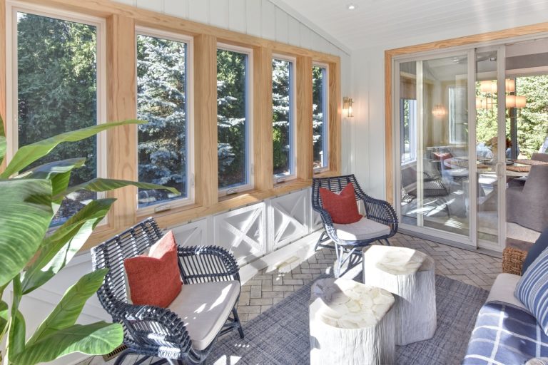 White Sunroom remodel VKB Homes unpainted window
